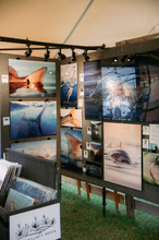 Load image into Gallery viewer, Show booth featuring artwork.
