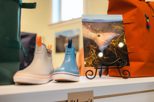Load image into Gallery viewer, Print on display in a fly shop.
